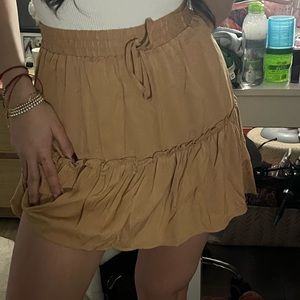 NWT tan mini skirt size M